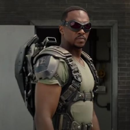 Anthony Mackie is wearing a spec and metal weapons.